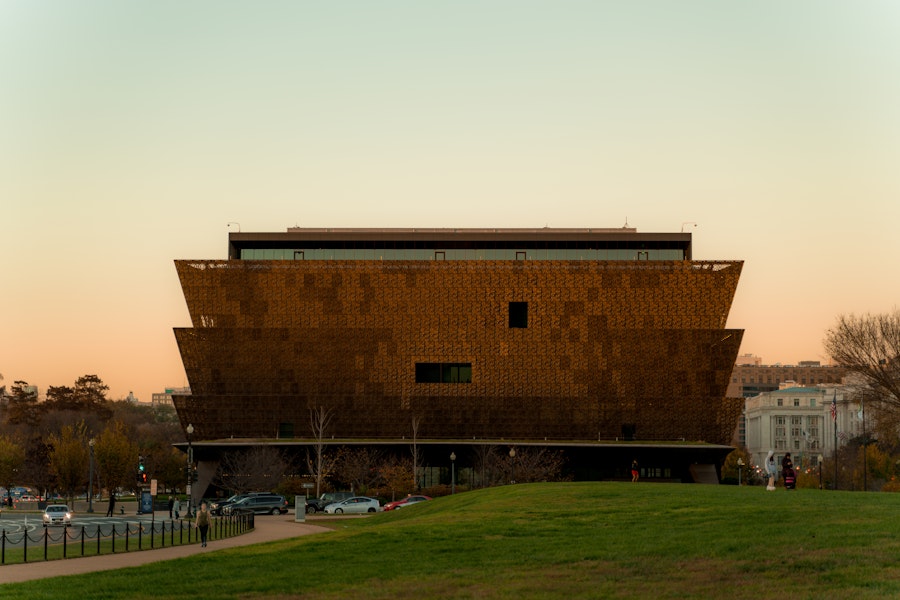 The National Museum of African American History and Culture in Washington, DC, at sunset.