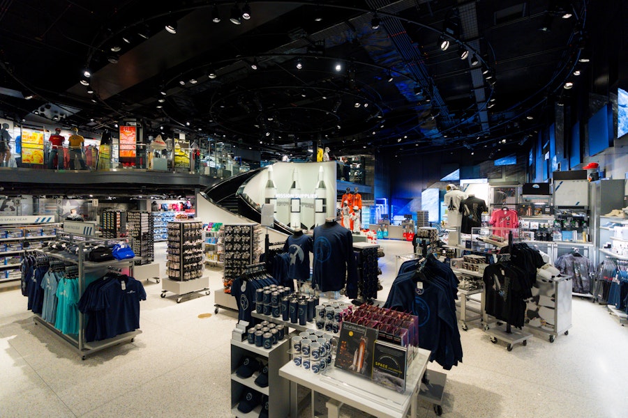 A wide view of the Smithsonian Air and Space Museum gift shop filled with space-themed merchandise.