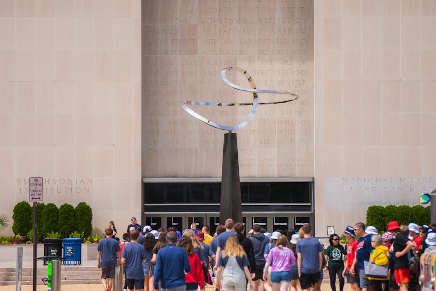 Groups of students enter the National Museum of American History.