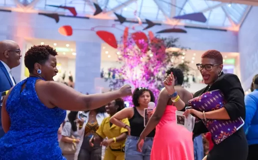 Guests dance and celebrate during a lively event at the National Gallery of Art in Washington, DC.